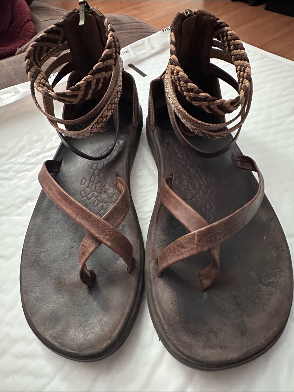 Women’s Chaco Leather Sandals with Braided Ankle Wraps.